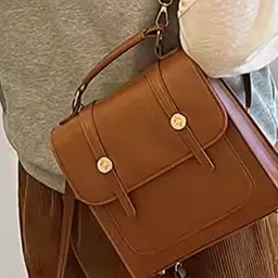 StyleCast Textured Half Moon Handheld Bag with Tasselled image 3