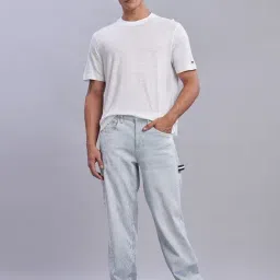 TOMMY HILFIGER Blue Slim Fit Solid Jeans image 5