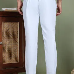 jompers White solid mid-rise pant style pyjamas, has a partially elasticated waistband with button closure, has two pockets image 2