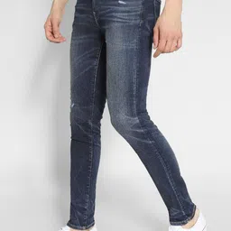 AMERICAN EAGLE OUTFITTERS Men Skinny Fit Mildly Distressed Light Fade Jeans image 5