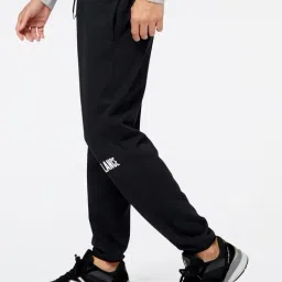 New Balance Black Cotton Regular Fit Sports Trackpants image 3
