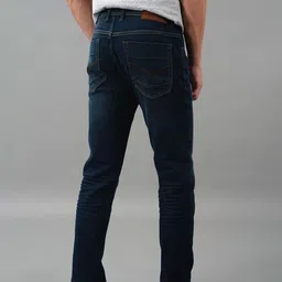 Rookies Men Slim Fit Mid-Rise Mildly Distressed Light Fade Stretchable Jeans image 3