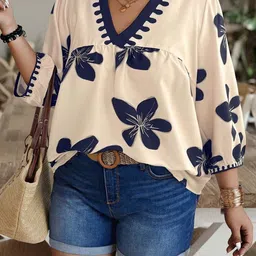 ANUTTARA FASHIONS Women V-Neck Floral Print Top image 1