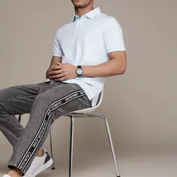 Calvin Klein Jeans Men Grey Dad Fit Light Fade Mid Rise Jeans With Printed Side Stripes image 5