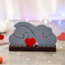 eCraftIndia White Wooden Cuddling Elephants With Heart Statues image 1
