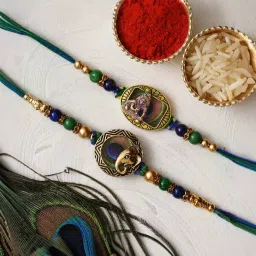 eCraftIndia Set of 2 Religious Rakhis for Brothers with Sibling Agreement & Roli Chawal Pack image 1