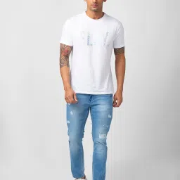 Spykar Light Blue Slim Fit Lightly Washed Distressed Jeans image 5