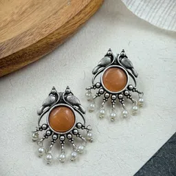 NAMAN ARTS Silver-Plated Stones Studded & Beaded Animal Shaped Oxidised Drop Earrings-image-89