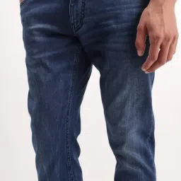 Rare Rabbit Blue Solid Slim Fit Jeans image 4