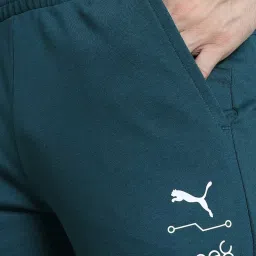 Puma x one8 Teal Slim Fit Printed Trackpants image 4