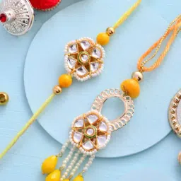 Aapno Rajasthan Exquisite Kundan Crafted & Pearl Hanging Bhaiya Bhabhi Rakhi Set-picture-11