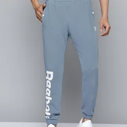 Reebok Classic Men Blue Solid Brand Logo Printed Joggers-image-84