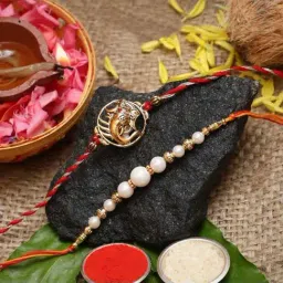 eCraftIndia Lord Ganesha & Pearl Rakhis with Roli Chawal Pack - Set of 2 image 2
