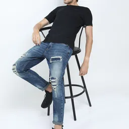 HIGHLANDER Men Blue Tapered Fit Mildly Distressed Heavy Fade Stretchable Ripped Jeans-image-81