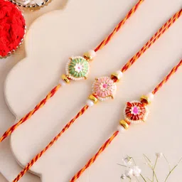 Myntra Elegant Homes Set Of 3 Beaded Rakhis With Greeting Card & Roli Chawal image 1