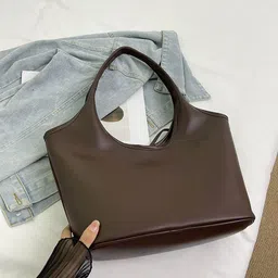 PURPLEHUNT Women Solid Leather Handheld Bag with Tasselled image 2