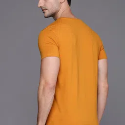 Louis Philippe Jeans Men Mustard Yellow Brand Logo Printed T-shirt image 5