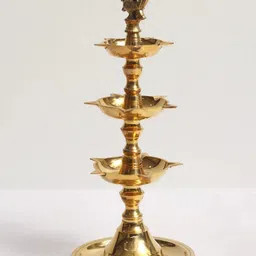 Exotic India Gold Toned Peacock Three-Layer Oil Lamp image 1