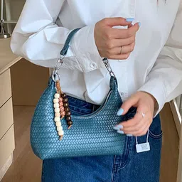StyleCast x Revolte Textured Swagger Handheld Bag image 1