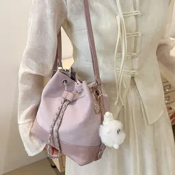 StyleCast x Revolte PU Swagger Sling Bag image 1