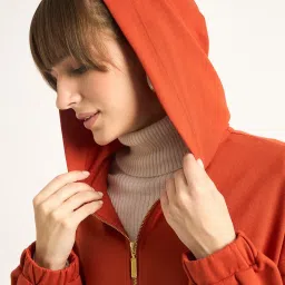 FEMMELLA Rust Relaxed Fit Solid Hooded Sweatshirt image 5