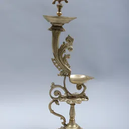 Exotic India Gold-Toned 2 Layer of Peacock Lamp with 2 Wicks (Hoysala Art) image 5