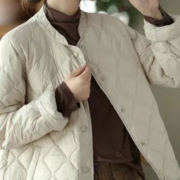 StyleCast x Revolte Puffer Jacket image 1