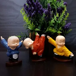 Afterstitch Yellow 4 Pieces Kungfu Monk Buddha Babies Figurine Showpiece image 2