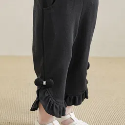 LULU & SKY Girls Solid Straight Fit Mid-Rise Frills Bows and Ruffles Flat-Front Trousers image 4