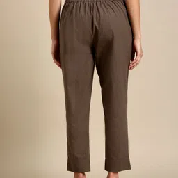 Punnu Women Brown Cotton Solid Peg Trousers image 4