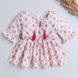 The Magic Wand Geometric Print Tie-Up Neck Puff Sleeve Cotton Peplum Top-picture-1
