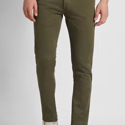 peter england Men Tapered Fit Mid Rise Dark Green Jeans image 1