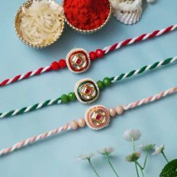 eCraftIndia Set of 3 Green, Pink & Red Kundan Rakhis with Sibling Agreement & Roli Chawal Pack-picture-27