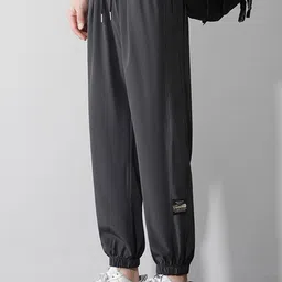 StyleCast x Revolte Men Mid-Rise Solid Regular Fit Trousers image 4