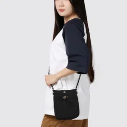 StyleCast x Revolte Sling Bag image 5