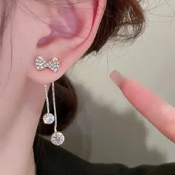 TheVineGirl Korean Silver-Plated Cubic Zirconia Studded Bow Shaped Drop Earrings image 1