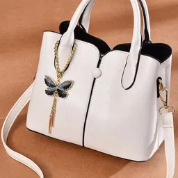 StyleCast Women Solid Structured Embellished Handheld Bag-picture-17