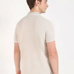 Tommy Hilfiger Men Solid Polo Collar Cotton T-shirt image 5