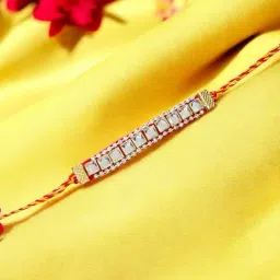 Anikas Creation White Elegant Handcrafted Rakhi with Mirror Stones for Brother-image-3