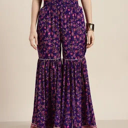 Shae by SASSAFRAS Women Purple Floral Printed Flared Ethnic Palazzos image 1