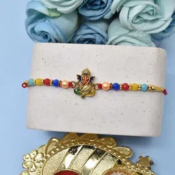MEIRA JEWELLERY Set Of 2 Designer Rakhis With Greeting Card & Roli Chawal image 3