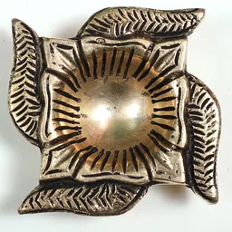 Exotic India Gold Toned Brass Swastik Diya-image-18