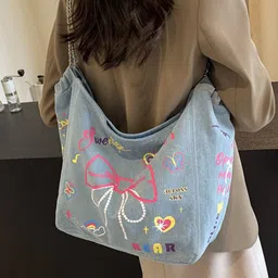 StyleCast x Revolte Printed Bucket Tote Bag image 4