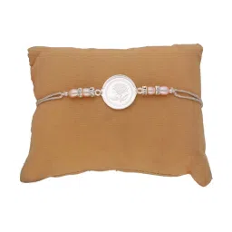 Sri Jagdamba Pearls 0.99 Silver Swastik Freshwater Pearls & CZ Rakhi image 1