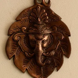 eCraftIndia Metal wall hanging of Lord Ganesha Head on Creative Leaf-image-24