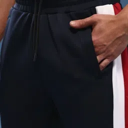 The Roadster Lifestyle Co Men Mid-Rise Track Pants With Side Strips image 4