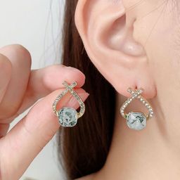 VAGHBHATT Gold-Plated CZ Studded Geometric Cushion-Cut Studs With Crossover Crystal Arch-picture-12