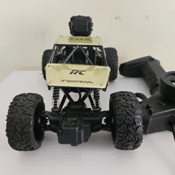 veda and gang metal climbing remote car image 2