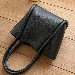 CORSICA Colourblocked PU Half Moon Sling Bag with Cut Work-picture-45