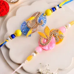 Myntra Elegant Homes Set Of 2 Stones-Studded & Beaded Rakhis & Greeting Card & Roli Chawal-picture-14